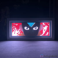 Boite lumineuse Aang Avatar mode sombre, yeux lumineux avec flammes rouges découpées sur fond bleu, décoration chambre