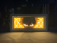 Boite lumineuse Bakugo rétroéclairée en jaune chaud dans l'obscurité, regard intense My Hero Academia décoration chambre