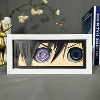 Boite lumineuse Ciel Phantomhive Black Butler éteinte, deux yeux hétérochromiques pentagramme violet et lune bleue