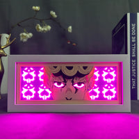 Boite lumineuse Giorno Giovanna allumée en rose LED vif, visage iconique JoJo's Bizarre Adventure, décoration chambre