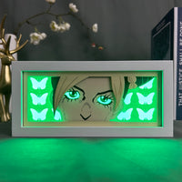 Boite lumineuse Jolyne Cujoh illuminée en vert LED, papillons lumineux de chaque côté du visage, décoration anime