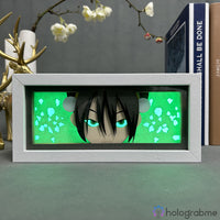 Boite lumineuse Toph Avatar cadre gris allumée vert, yeux turquoise lumineux et oreilles d'ours découpées illuminées