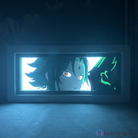 Boite lumineuse Xiao Genshin Impact rétroéclairée en bleu, portrait du personnage aux cheveux noirs avec détails jade