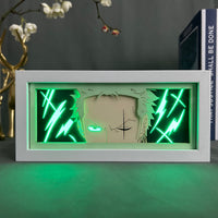 Boite lumineuse Zoro éclairée vert fluo, regard de sabreur avec éclairs lumineux verts intenses décoration gaming anime
