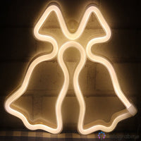 Néon LED cloches de Noël blanc chaud accroché au mur de briques, décoration murale de Noël